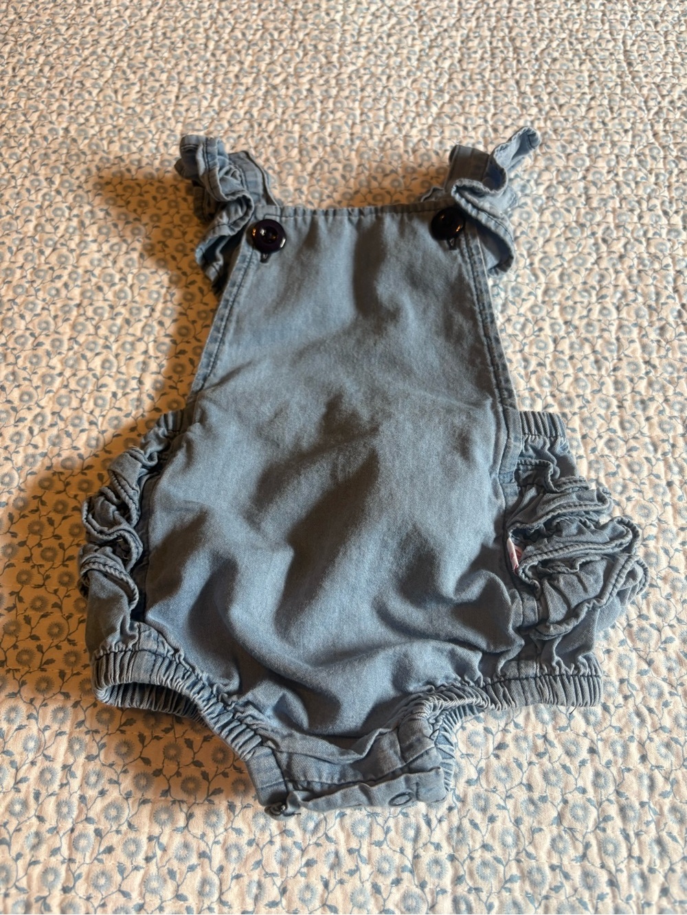 Ruffle Butts Denim-Style Romper in Light Blue